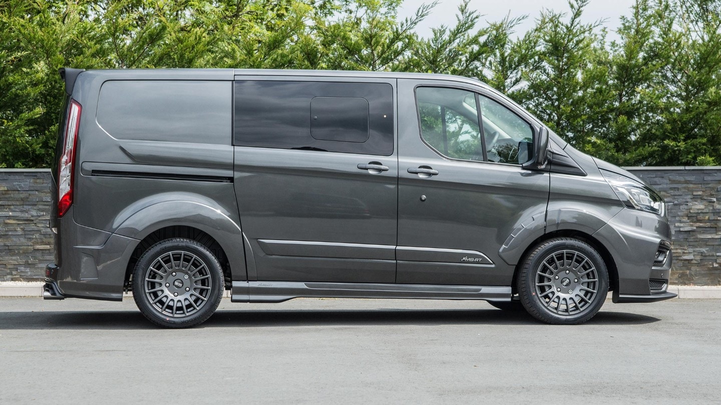 Side view of a Ford Transit Custom MS-RT Van parked in a residential area