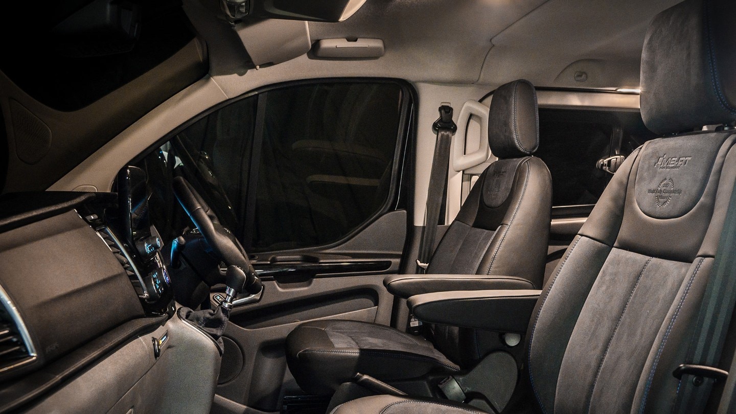 Interior view of the Ford Transit Custom MS-RT showing the passenger, driver seats and dashboard