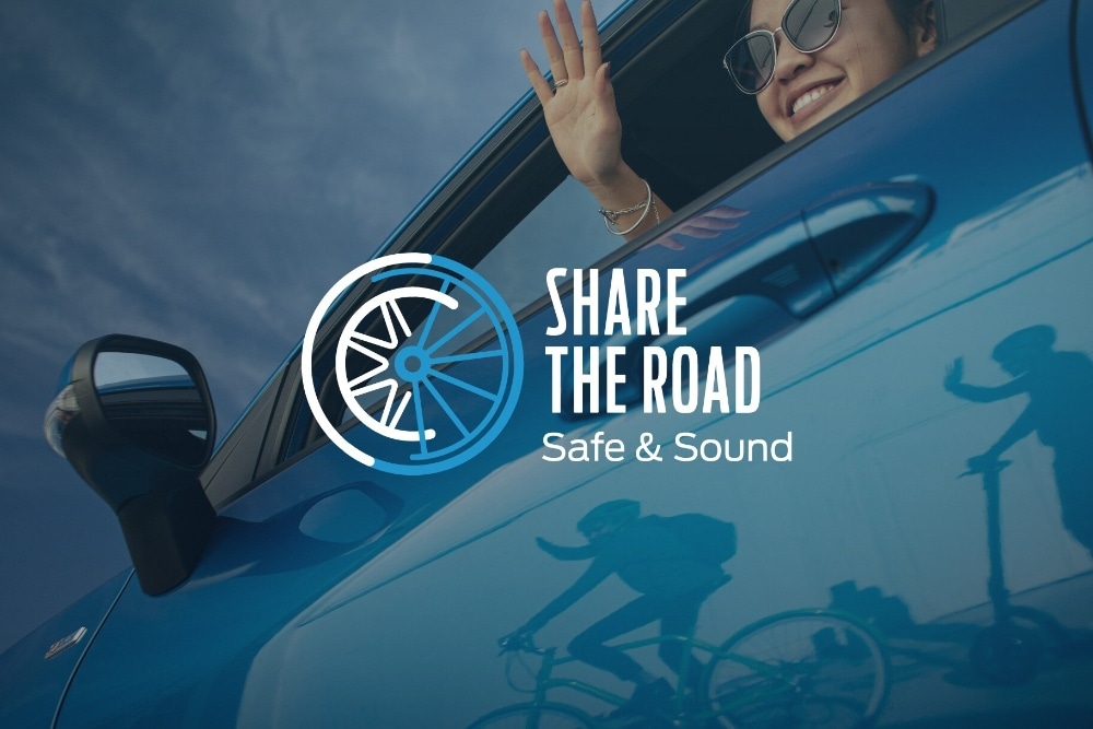 Share the road logo