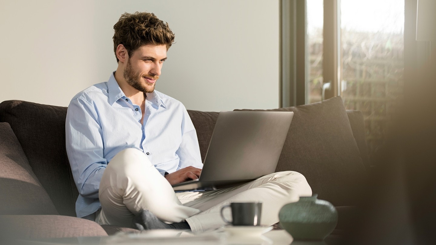 Man booking an online service booking on his laptop