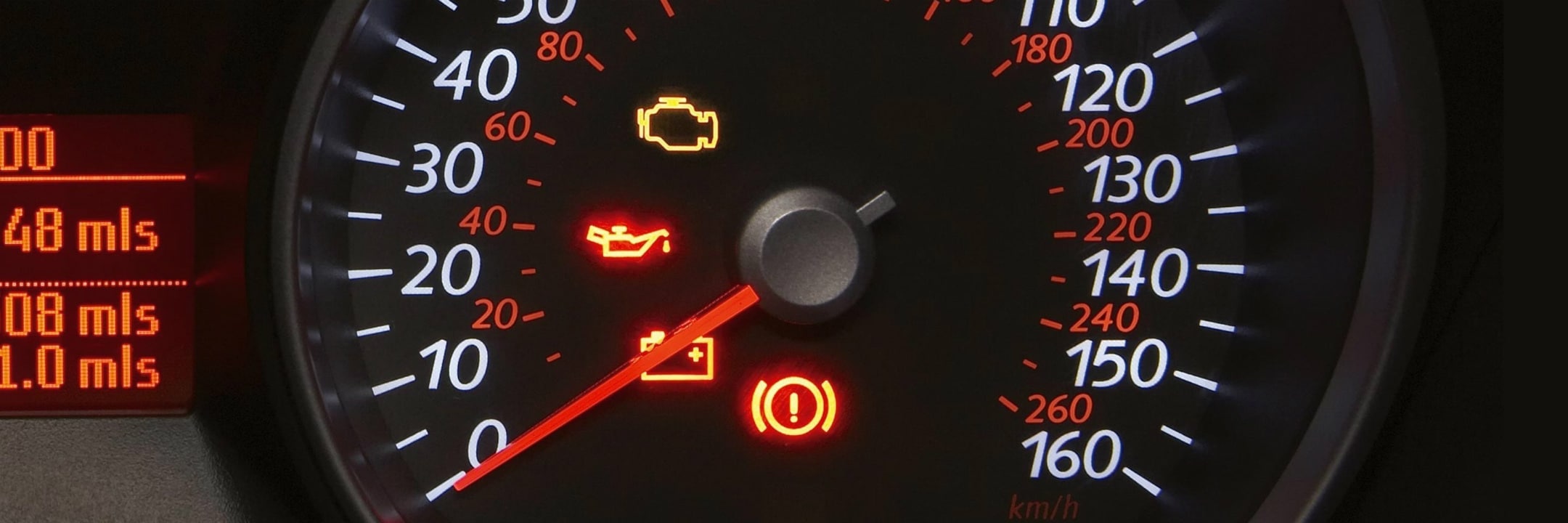 Close-up of the speedometer and warning lights