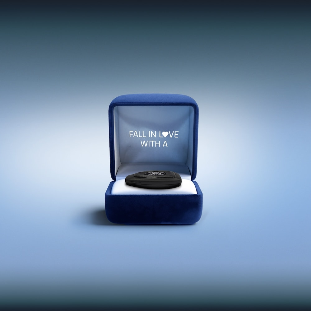 Fall in love with a Ford event. Ring box with a Ford car key inside. 