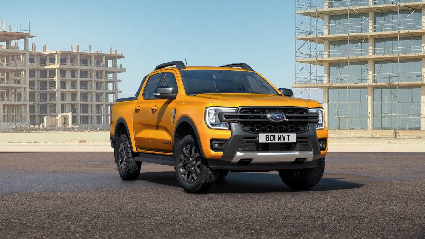 Front view of a orange Ford Ranger parking