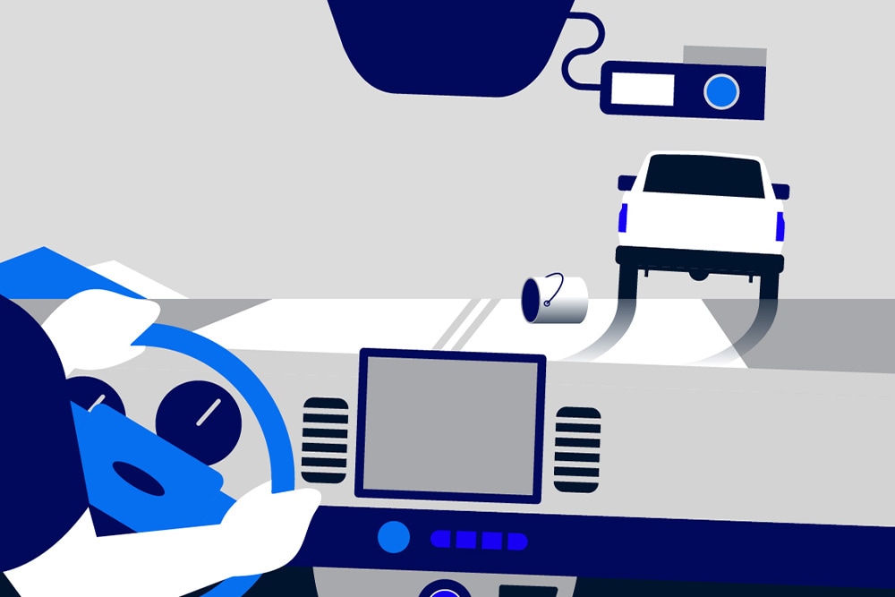 Driver's view with a dashcam, showing a white Ford van with a dropped bucket behind it, illustrating an incident.