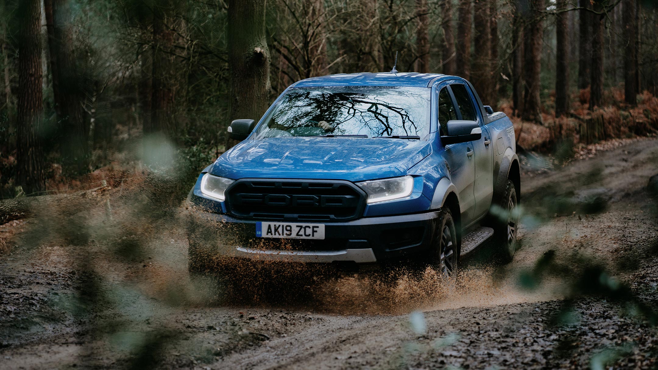 Ford Ranger Raptor on dirt road Ford Ranger Raptor on dirt road
