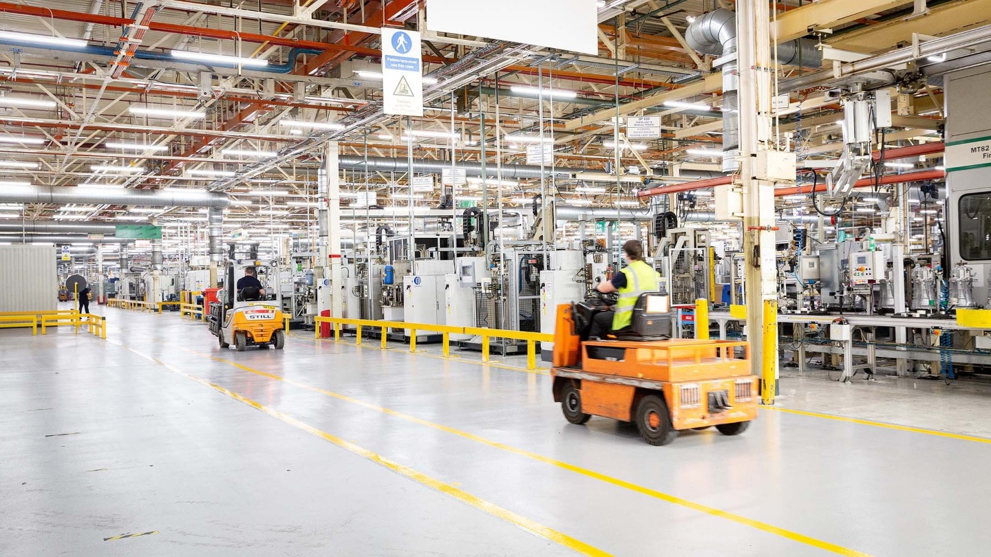 Forklifts driving in the warehouse