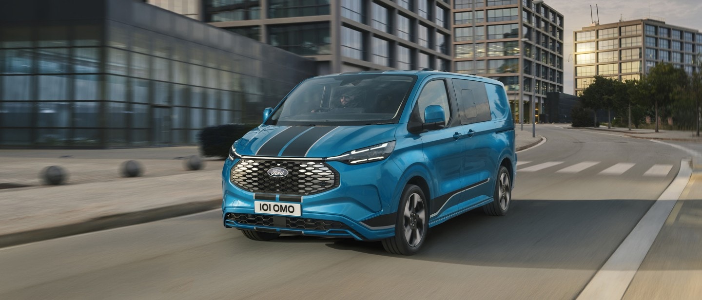 Blue E-Transit Custom driving