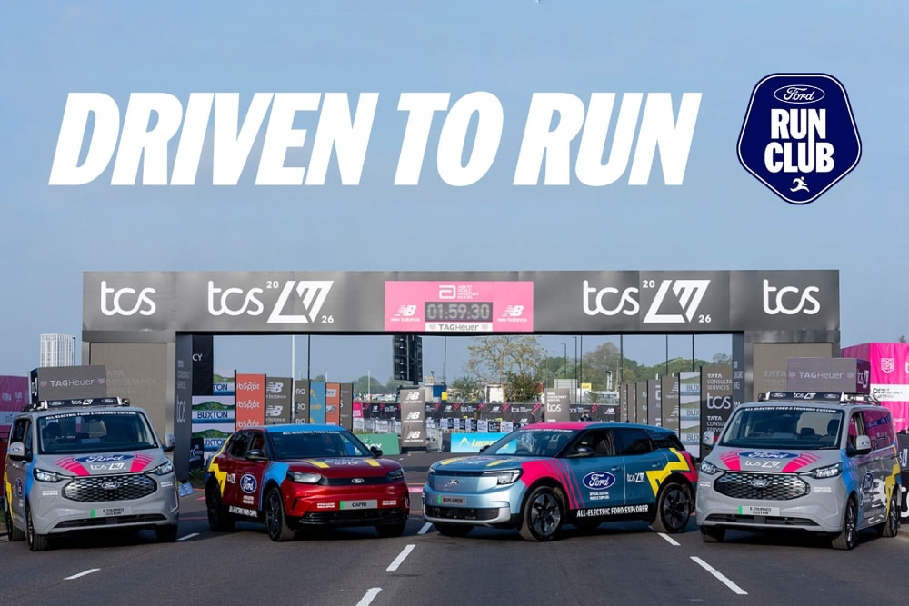 Ford E-Tourneo Custom vans, red Ford Capri, and blue Ford Explorer at a marathon finish line. 'DRIVEN TO RUN'.