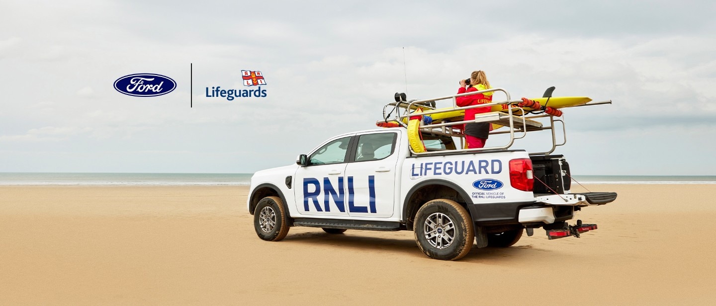 White RNLI Lifeguard vehicle on the beach