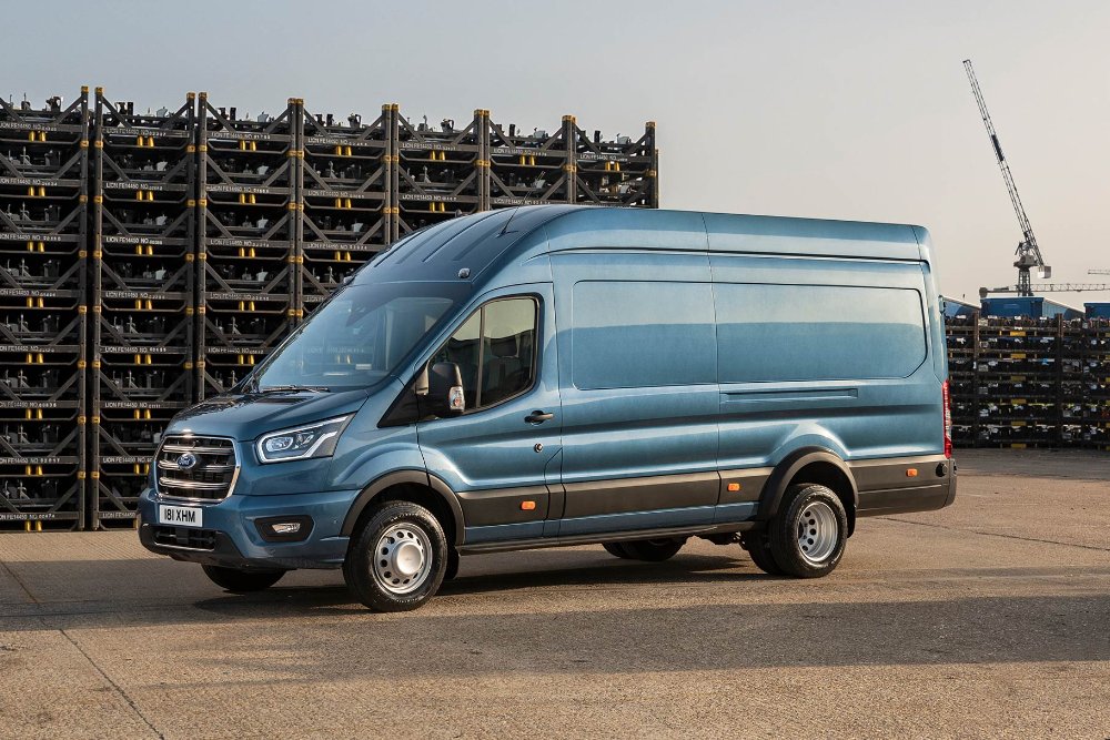 A blue Ford Transit in an industrial setting