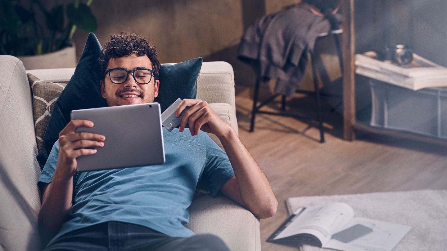 Man lying on sofa