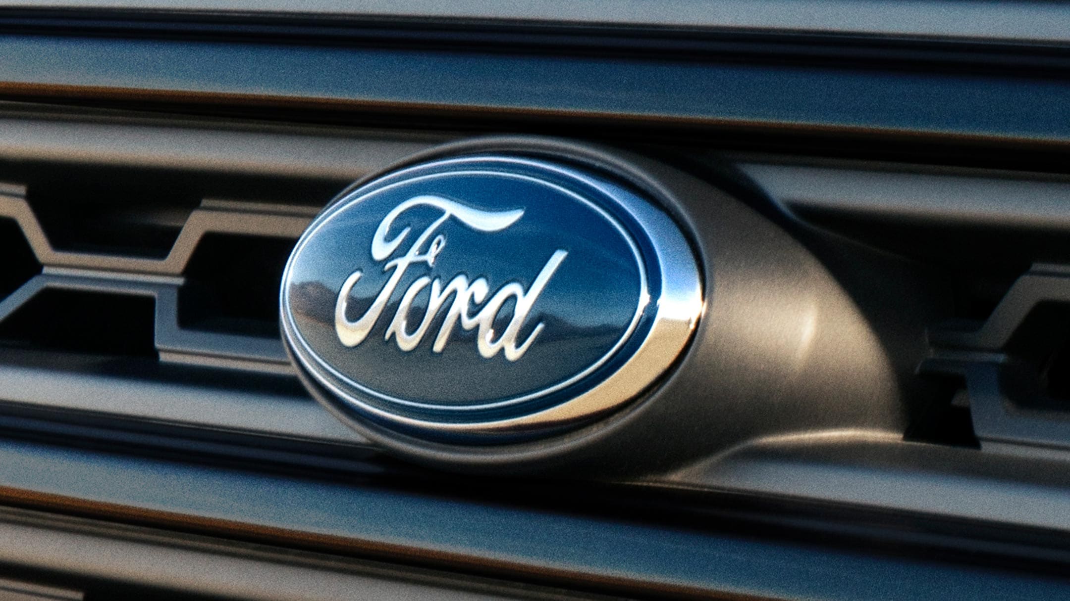 Ford oval logo detail view on a vehicle grille